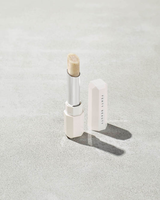 Pro Kiss'r Lip-Loving Scrubstick standing upright with the cap off and the lip scrub twisted up.