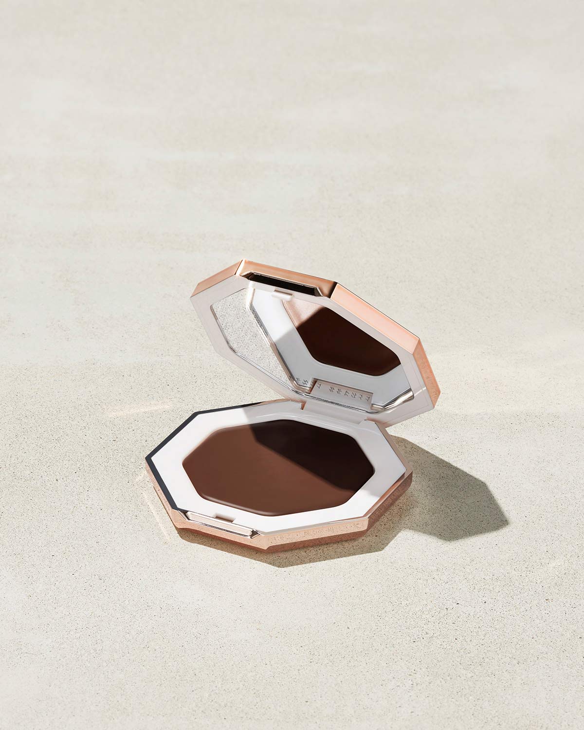 Cheeks Out Freestyle Cream Bronzer shown in shade Chocolate