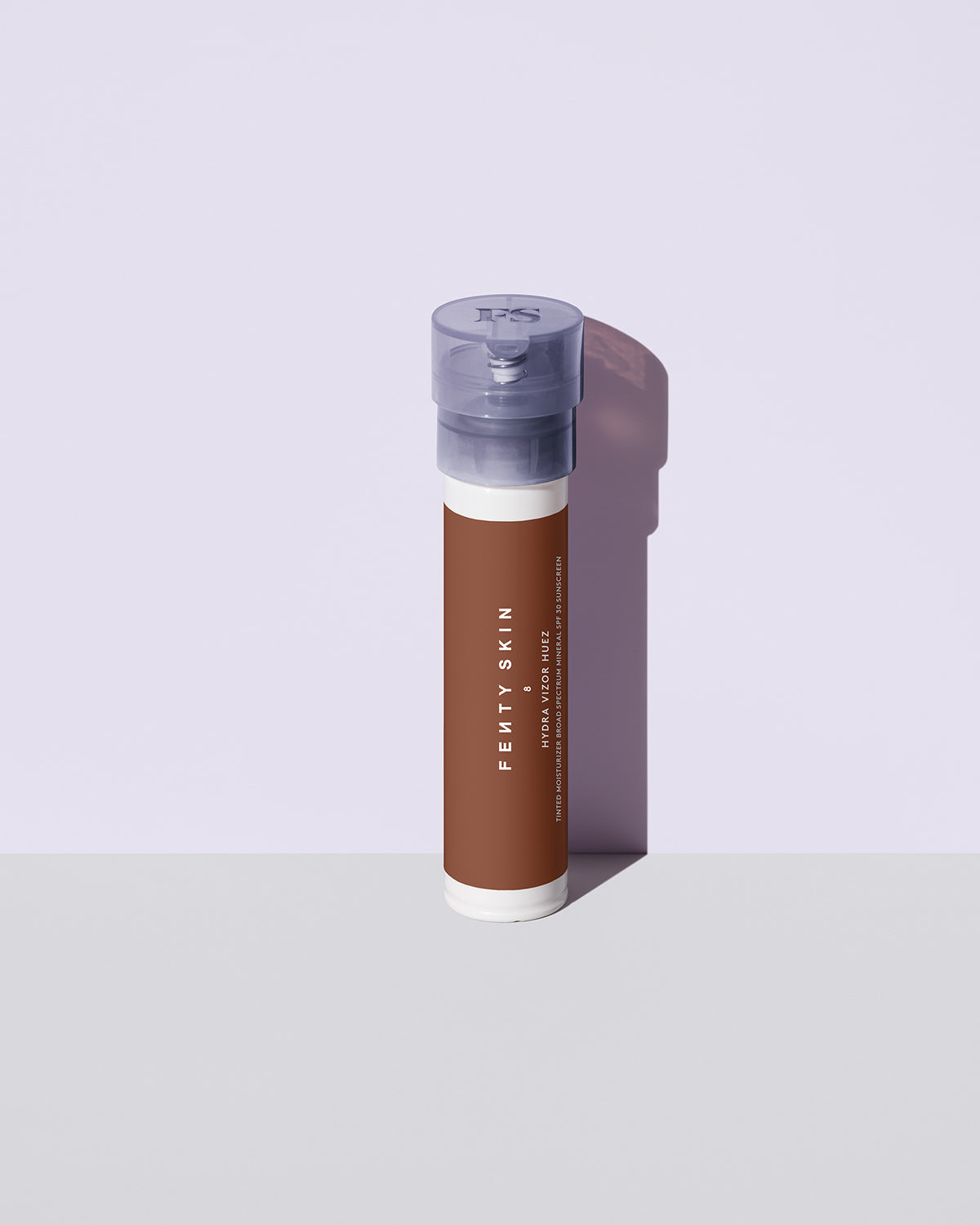 Hydra Vizor Hues tinted moisturizer sunscreen refill in shade 8 against a lavender background.